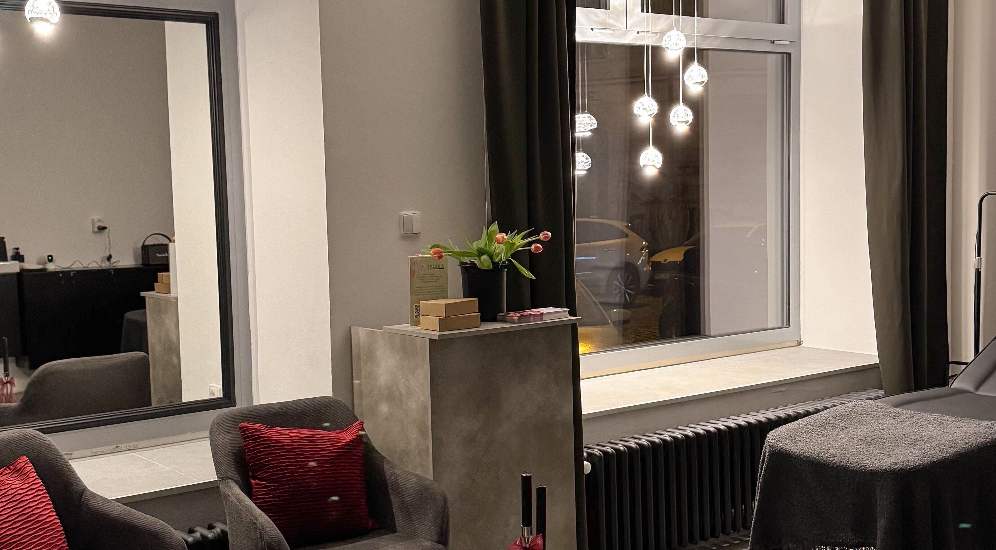 Cozy interior of Rituals By Nanda in Praha, CZ with a modern decor and soft lighting.