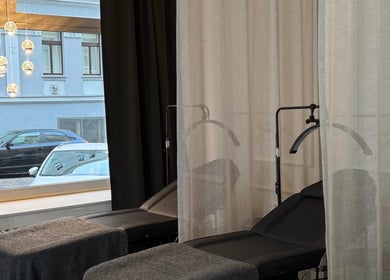 Cozy treatment area at Rituals By Nanda, Praha, CZ with stylish decor and soothing ambiance.