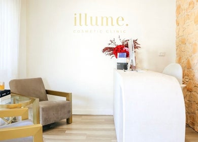 Elegant reception area at Illume Cosmetic Clinic in Clayfield, Queensland, AU featuring minimalist decor.