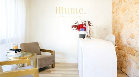 Elegant reception area at Illume Cosmetic Clinic in Clayfield, Queensland, AU featuring minimalist decor.