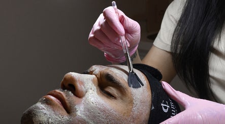 Facial treatment at Illume Cosmetic Clinic, Clayfield, Queensland, AU. Applying mask with brush for relaxation.