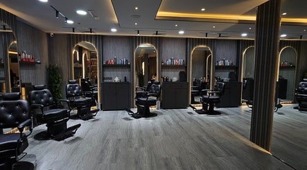 Modern interior of B Sleek Gents Salon, with luxurious chairs in Dubai, Dubai, AE.
