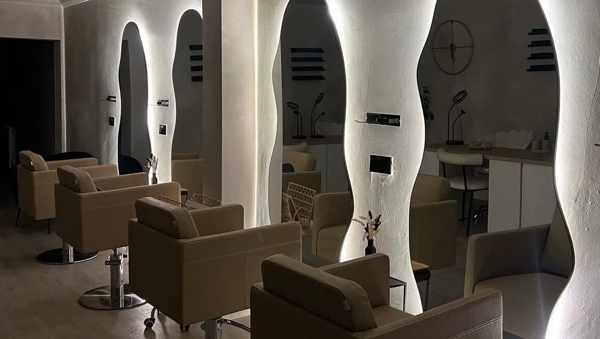 Luxe styling chairs in Custom Brow Studio, Swinton, England, GB, with chic lighting accents.