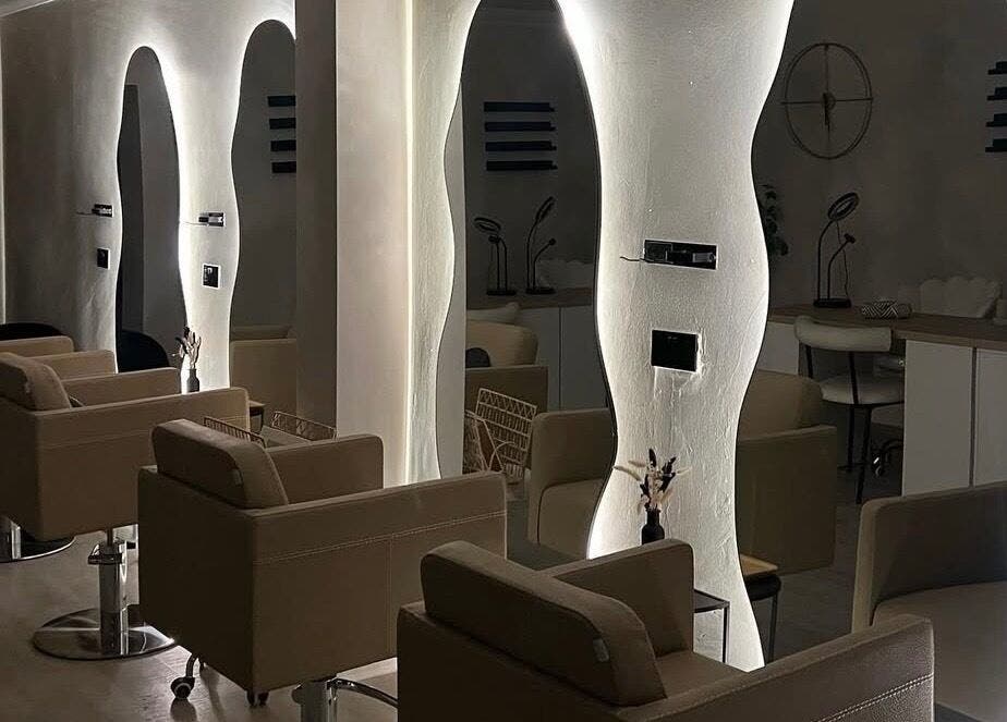 Luxe styling chairs in Custom Brow Studio, Swinton, England, GB, with chic lighting accents.