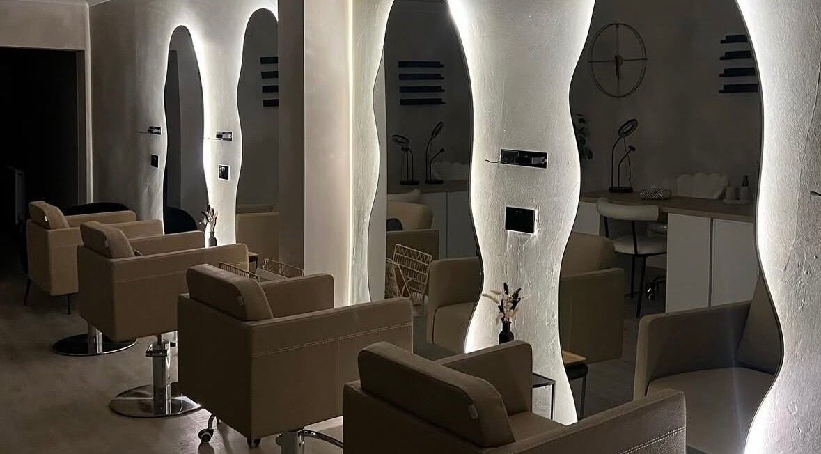 Luxe styling chairs in Custom Brow Studio, Swinton, England, GB, with chic lighting accents.