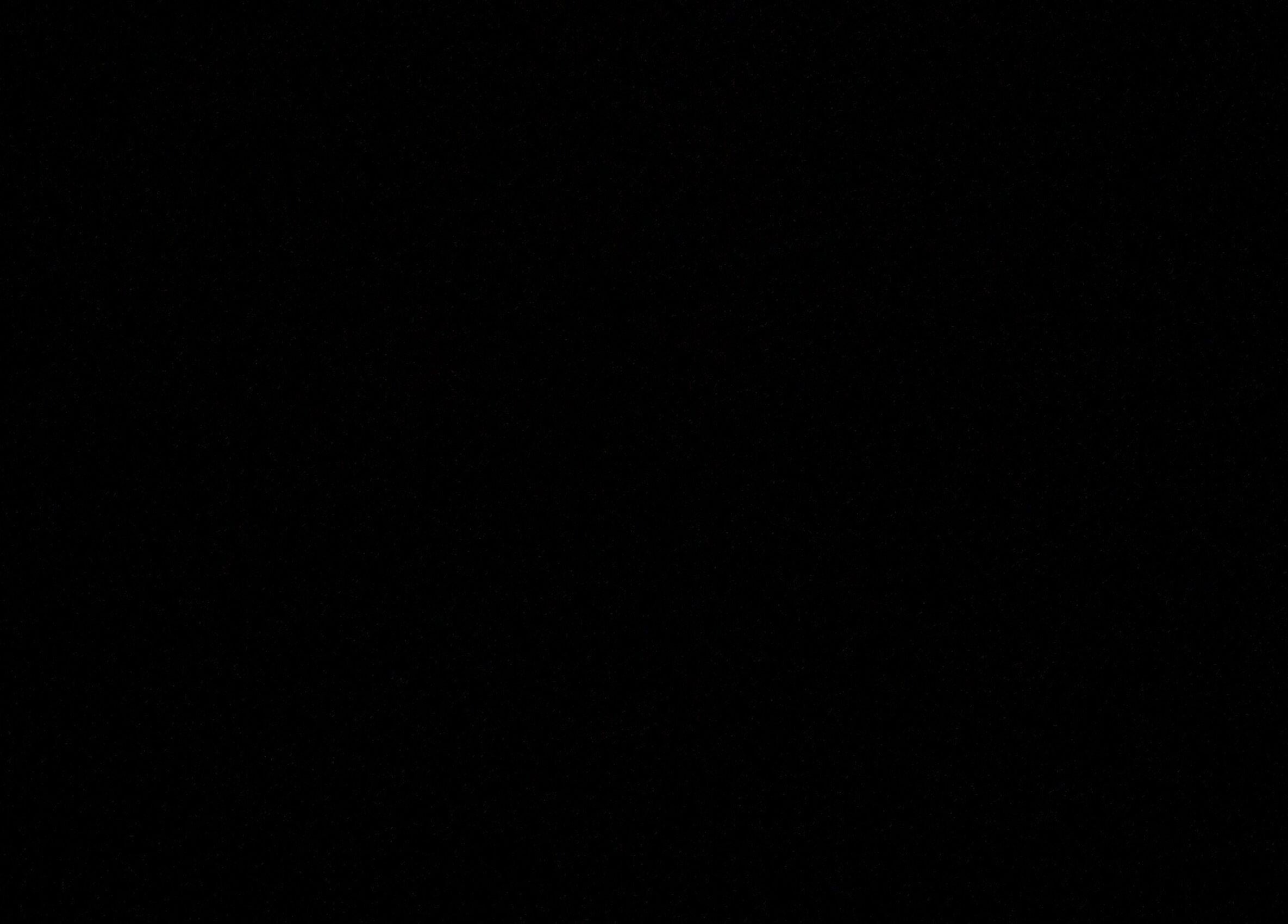 Cozy interior of MFB.Cutz in Birmingham, England, GB with stylish chairs and decor.