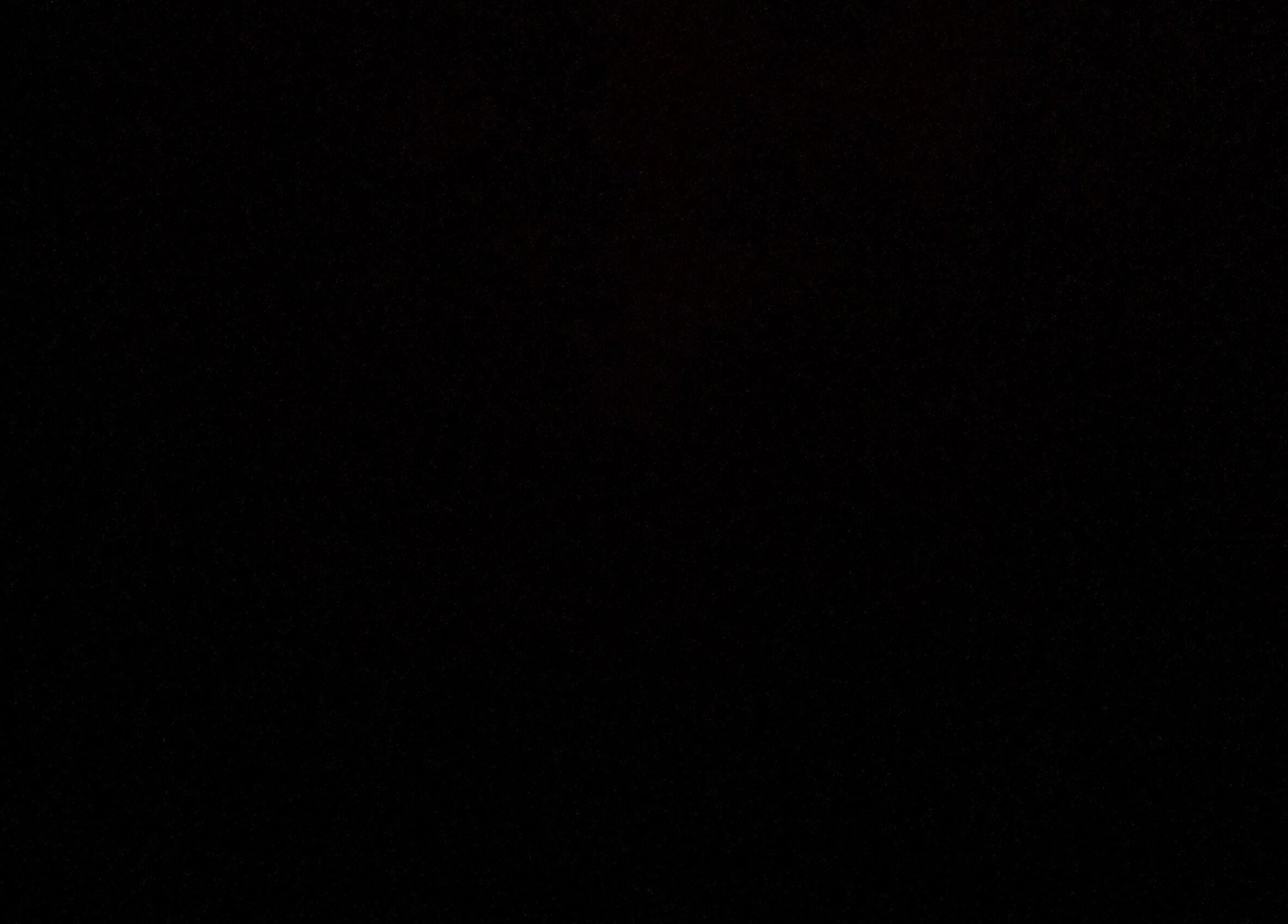 Dark ambiance at MFB.Cutz in Birmingham, England, GB, highlighting its serene and sophisticated atmosphere.