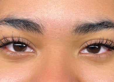 Close-up of eyelash extensions at Omorfia by Amari, Couva, TT, showcasing natural beauty enhancements.