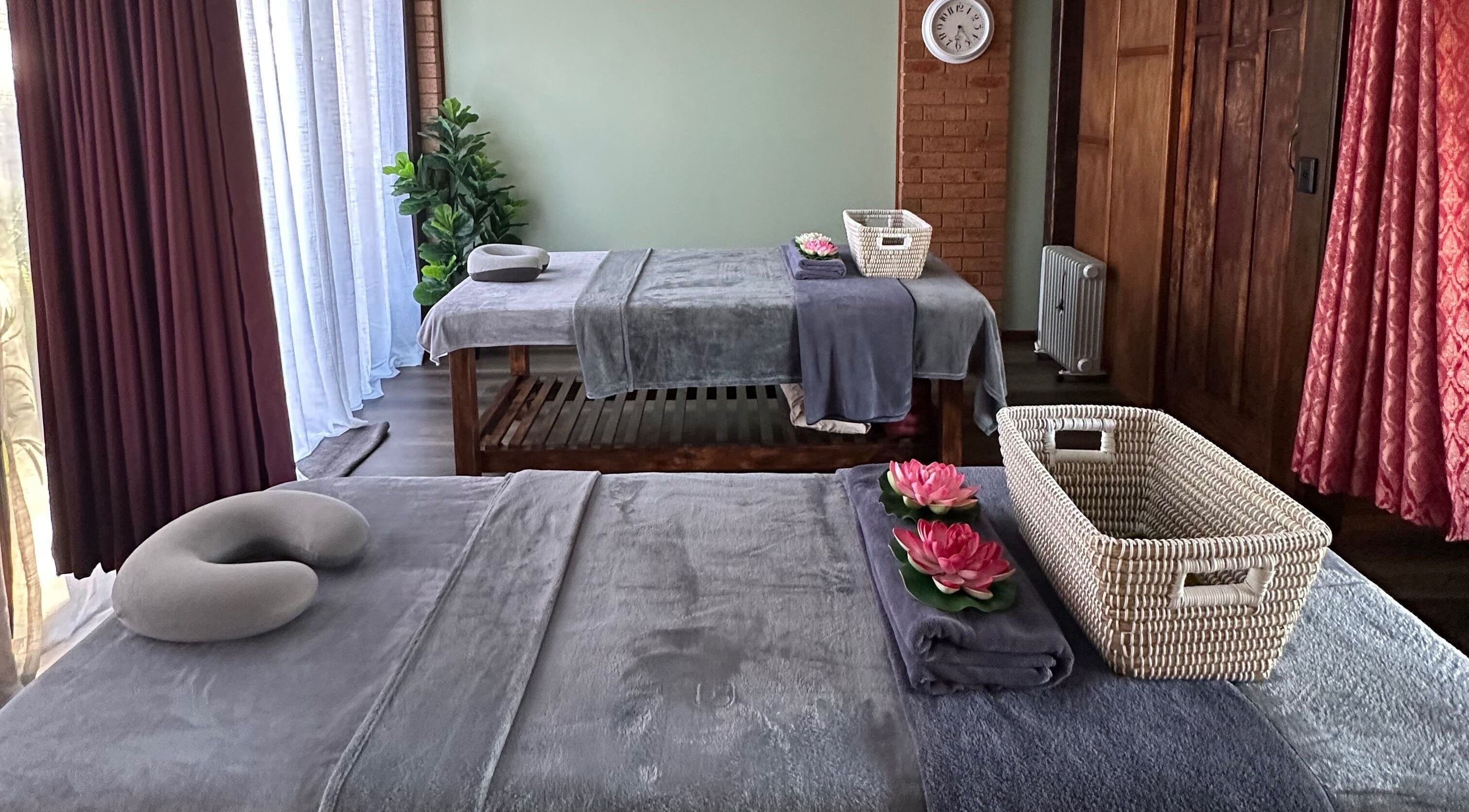 Relaxing massage room at Zenzone Massage & Wellness Studio, Mornington, Victoria, AU with serene decor.
