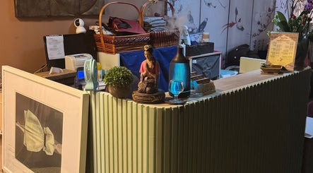Cozy reception at Siam Thai Massage & Spa, HK, HK, featuring cultural decor and soothing ambiance.