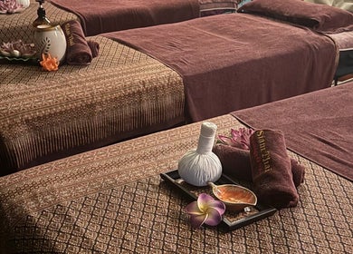 Elegant massage tables at Siam Thai Massage & Spa, HK, HK with traditional decor for ultimate relaxation.