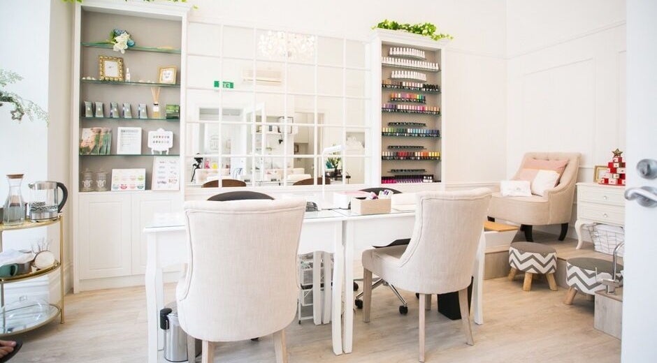 Elegant interior of H Nail Garden - Prahran in Prahran, Victoria, AU with stylish nail polish displays.