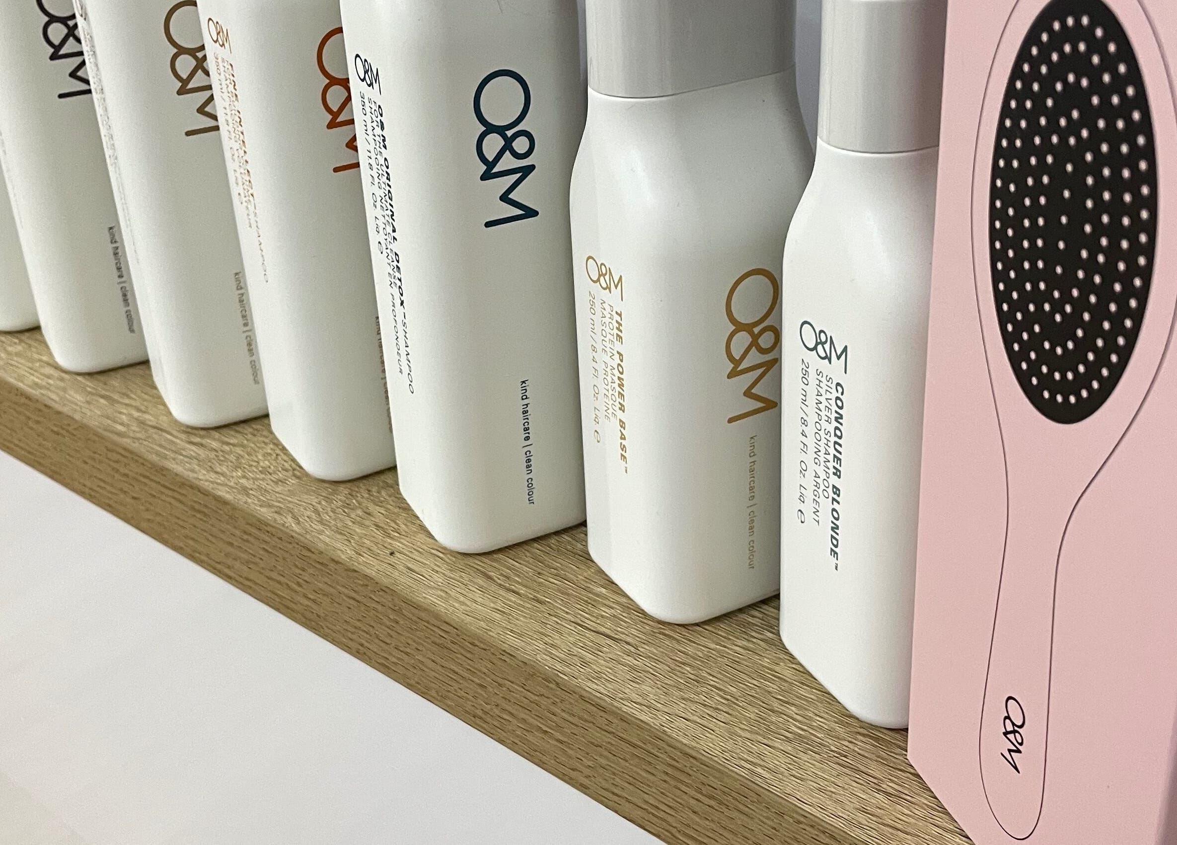 Premium hair products lined up at Smiths Lake Hair Studio in Smiths Lake, New South Wales, AU.