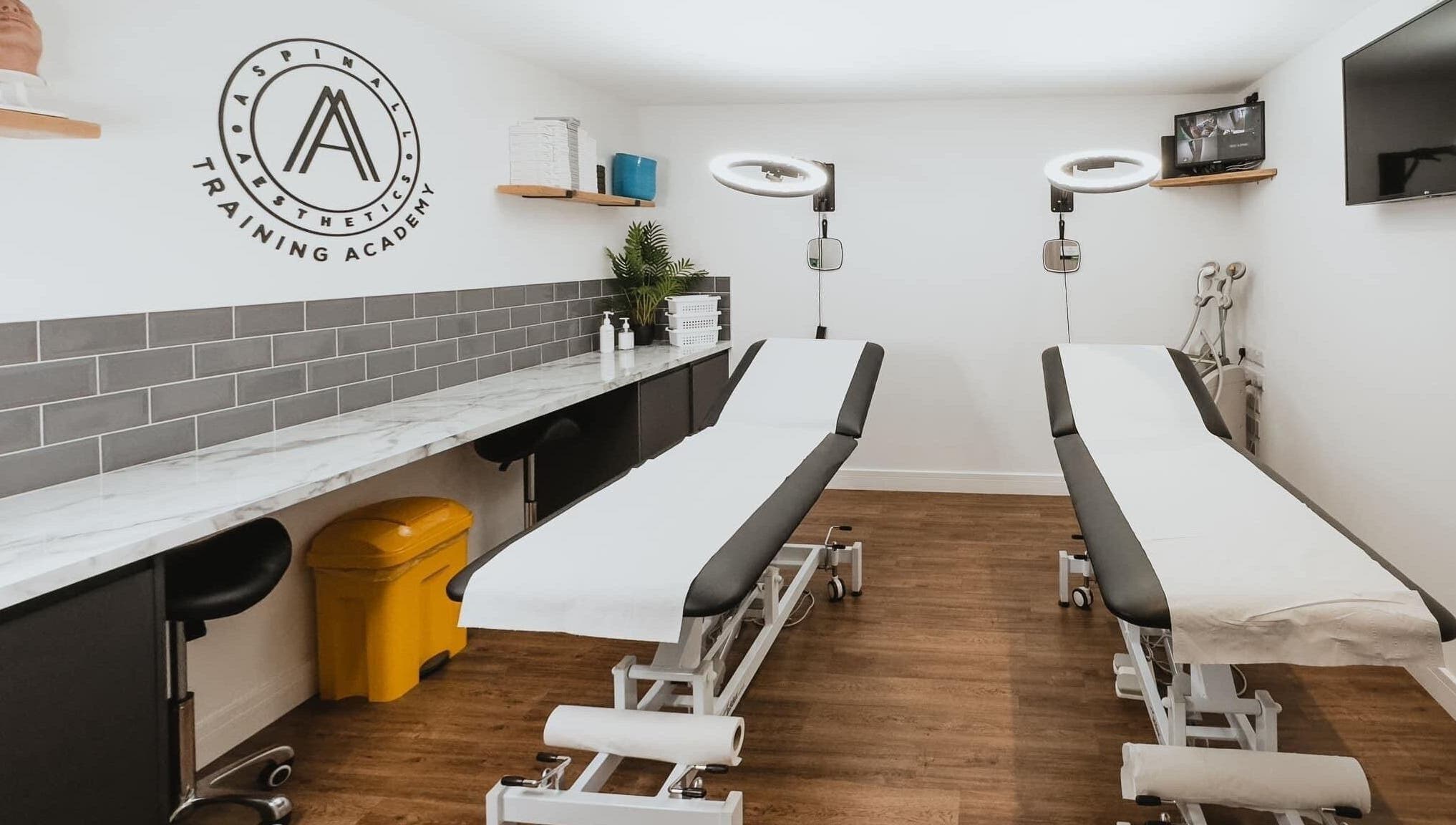 Modern treatment room at Aspinall Aesthetics in Kingswood, England, GB with professional setup.