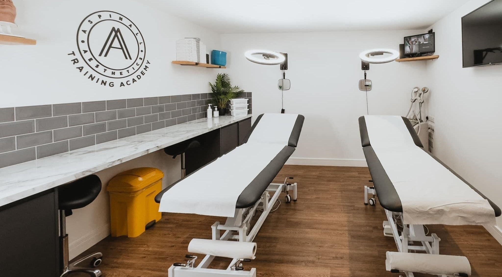 Modern treatment room at Aspinall Aesthetics in Kingswood, England, GB with professional setup.