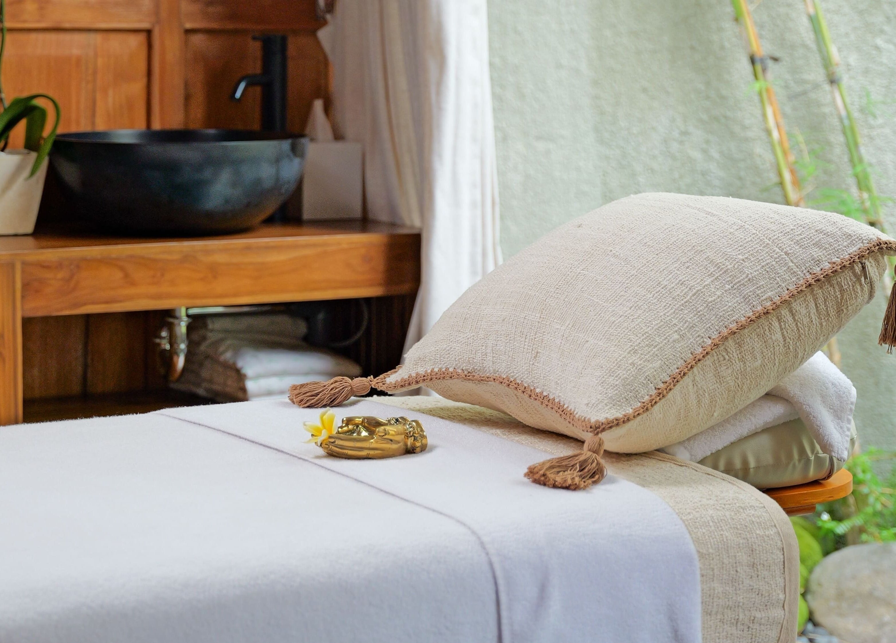 Relaxing massage table at Hidden Gem Spa Uluwatu, Bali featuring a serene setup in Bali, Bali, ID.
