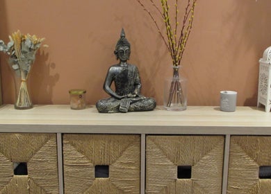 Buddha statue with decor at Laura Jane Holistic in Bristol, England, GB offering a serene ambiance.
