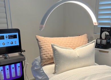 Relaxing treatment room with HydraFacial setup at The Dermal Collection, Cape Town, Western Cape, ZA.