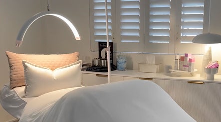 Luxurious spa bed at The Dermal Collection, Cape Town, Western Cape, ZA, showcasing modern wellness essentials.