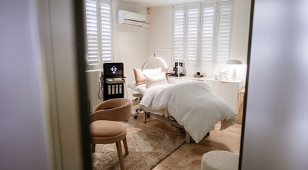 Elegant treatment room at The Dermal Collection, Cape Town, Western Cape, ZA, showcasing a relaxing spa bed.