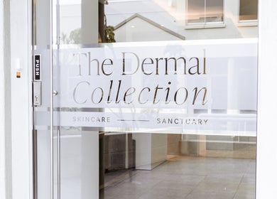 Entrance to The Dermal Collection in Cape Town, Western Cape, ZA. Glass door with branding.