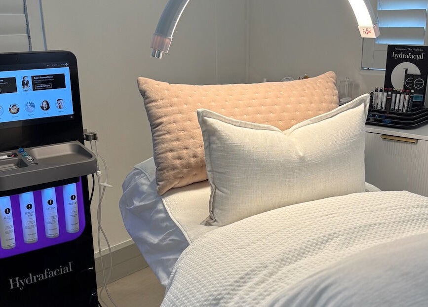 HydraFacial suite at The Dermal Collection, Cape Town, Western Cape, ZA, showcasing a serene treatment area.