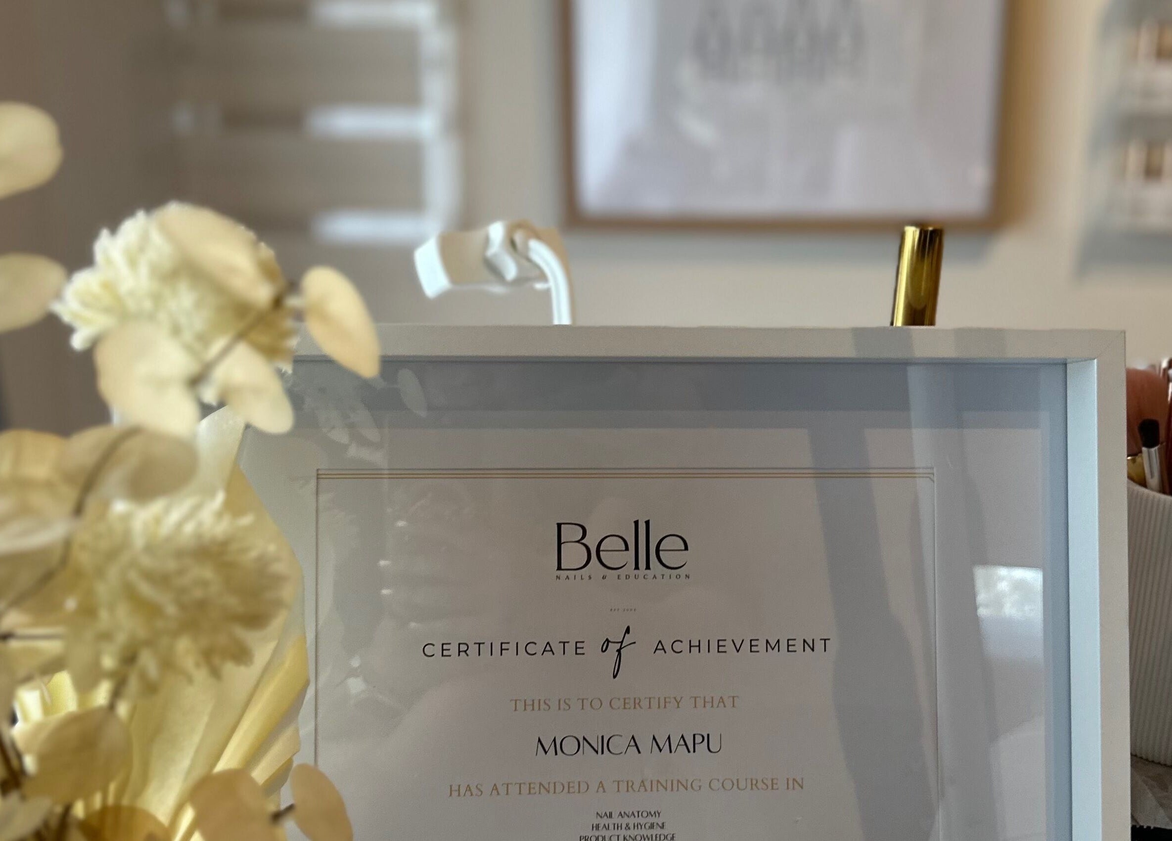 Certificate of Achievement at Nails by Monica Mapu, Killarney Vale, New South Wales, AU, with decor accents.