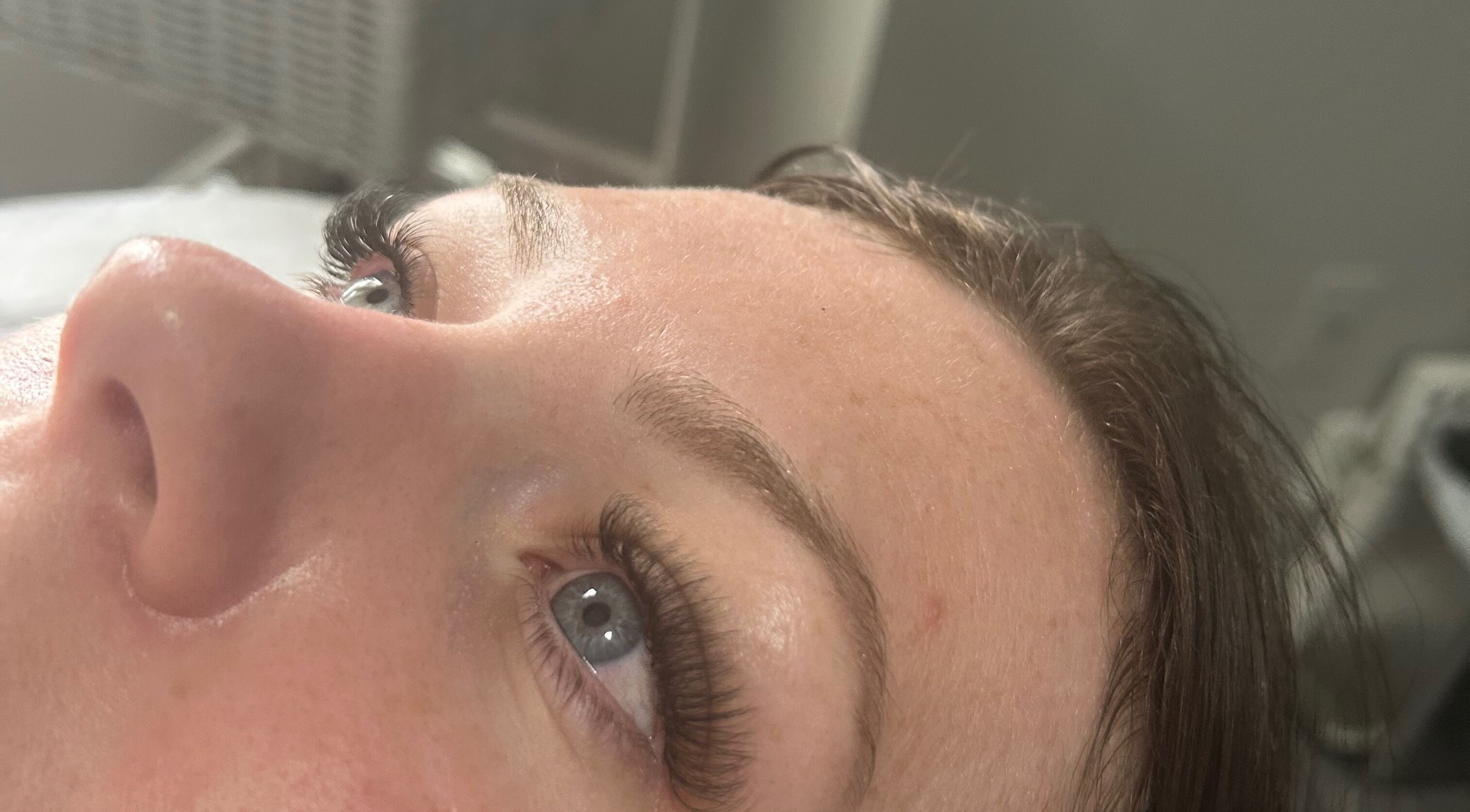 Close-up of lash extensions at Endulgence Esthetics, London, Ontario, CA, showcasing refined beauty.