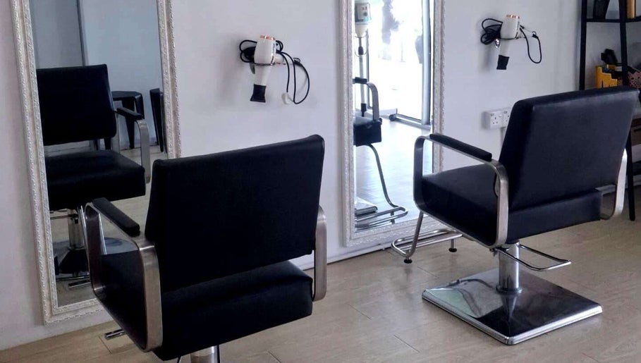 Chic salon chairs and mirrors at Mekar Anggun Beauty & Salon, Kuantan, Pahang, MY showcasing stylish elegance.
