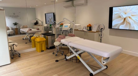 Spacious treatment room at Liberation Electrolysis, Worthing, England, GB, featuring modern equipment and decor.