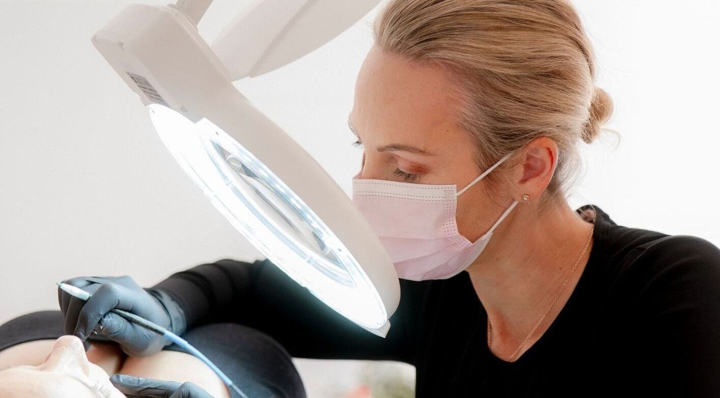 Electrologist at Liberation Electrolysis, Worthing, England, GB, performing precise treatment.