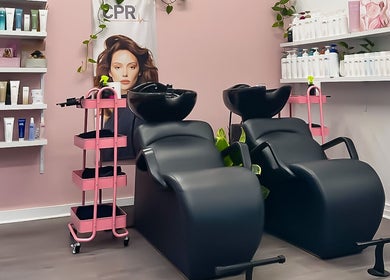 Chic hair wash stations at Katy & Co. Hair in Engadine, New South Wales, AU, designed for luxury and comfort.