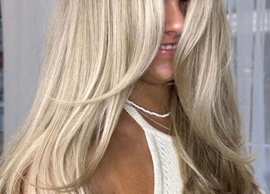 Elegant blonde hairstyle at Katy & Co. Hair in Engadine, New South Wales, AU showcasing expert styling.