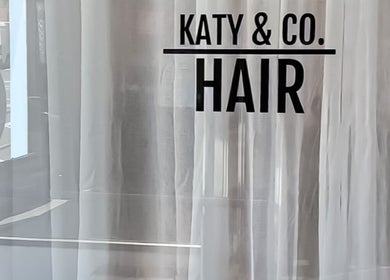 Entrance view of Katy & Co. Hair salon showcasing contemporary design in Engadine, New South Wales, AU.