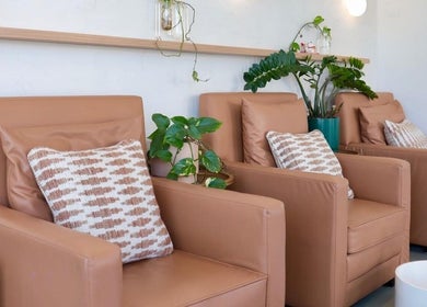 Comfortable seating in serene setting at Cosmetics by Nurse Juliette, Alexandria, New South Wales, AU.