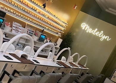 Interior of Madelyn Chicago Nail Spa with elegant manicure stations, Chicago, Illinois, US.