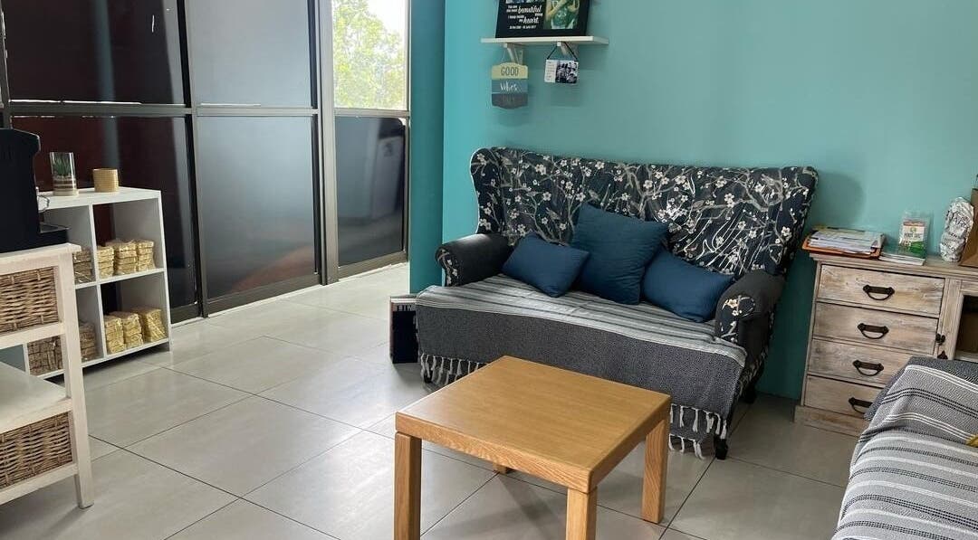 Inviting seating area at MOOI NOOI HAIR SALON in Windhoek, Khomas Region, NA with comfortable couches.