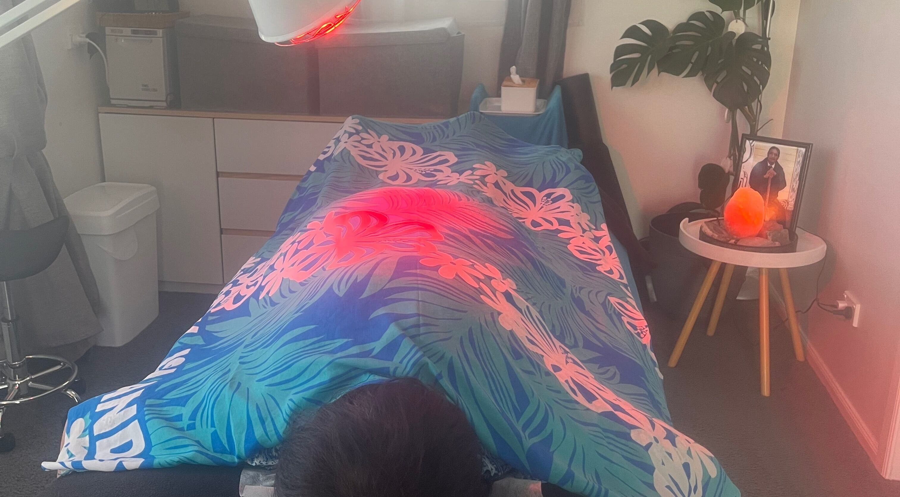 Relaxing healing session at Koru Body Soul Māori Healers, Te Awamutu, Waikato, NZ with soothing red light therapy.