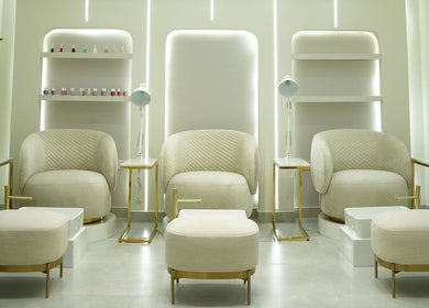 Elegant pedicure chairs at Aura Blend Ladies Salon in Dubai, Dubai, AE, offering premium beauty treatments.