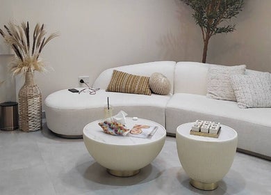 Modern lounge area at Aura Blend Ladies Salon, Dubai, Dubai, AE, featuring elegant white seating and decor.