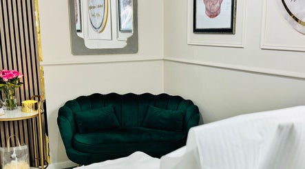 Green velvet couch and decor at NZ Aesthetic Cosmetology, Coventry, England, GB.