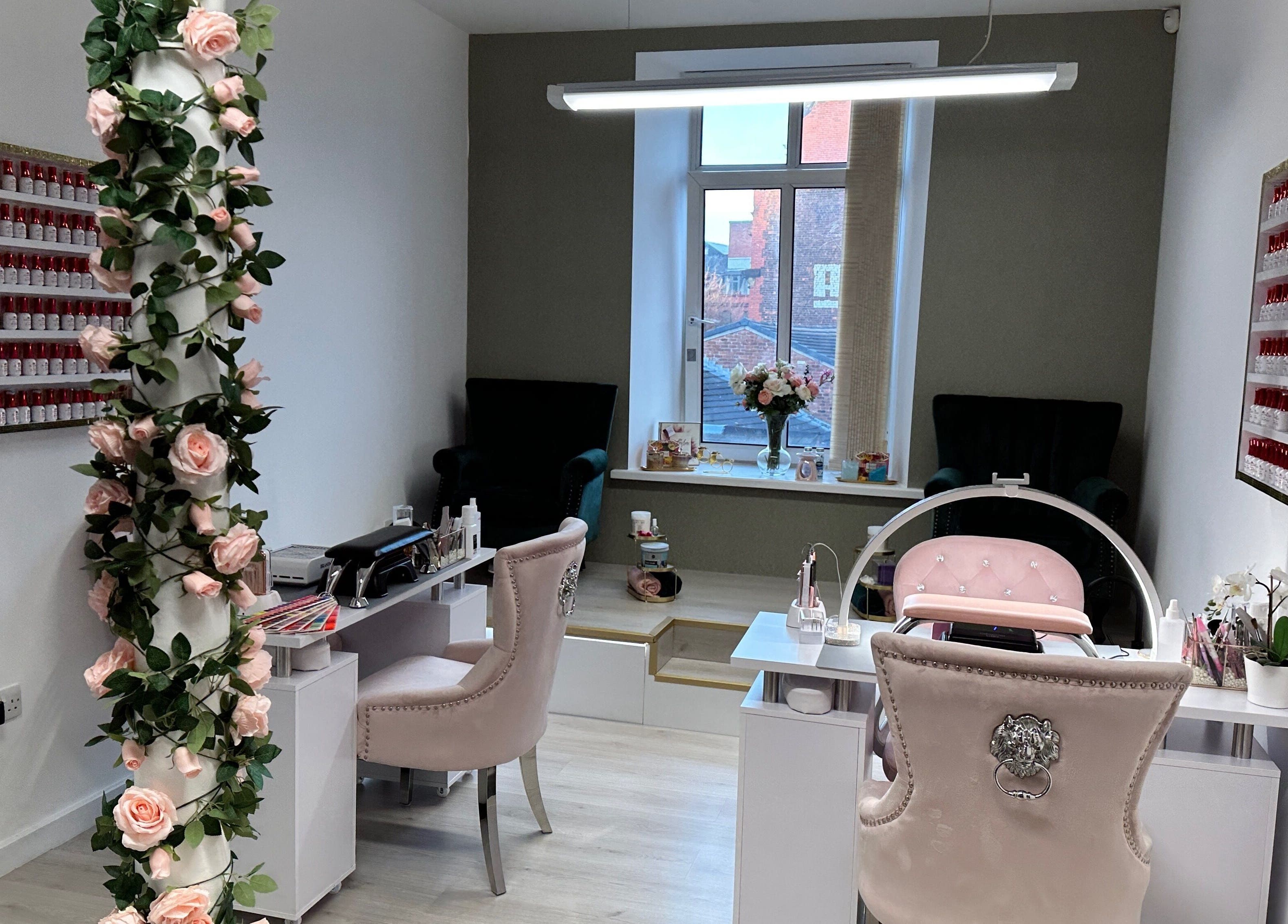 Beautiful interior of Eleganza Nails, Manchester, England, GB, showcasing chic decor and nail polish display.