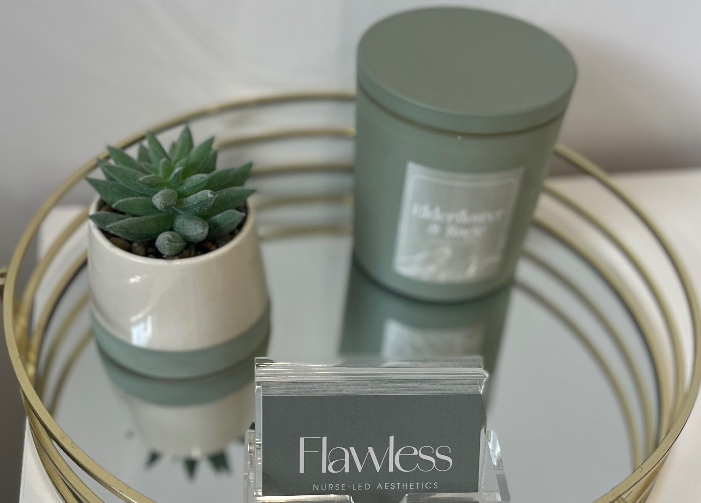 Stylish decor at Flawless, Lostock Hall, England, GB with a succulent and a green candle.