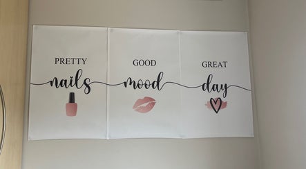 Inspiring wall art at Nails by Jessica, Wicklow, County Wicklow, IE, with nail polish and motivational phrases.