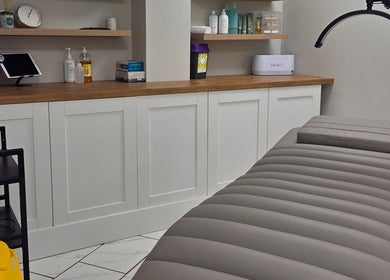 Relaxing treatment room at Brow & Beauty, Mansfield, England, GB, showcasing clean and inviting decor.