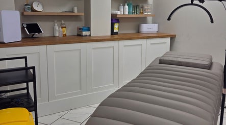 Relaxing treatment room at Brow & Beauty, Mansfield, England, GB, showcasing clean and inviting decor.