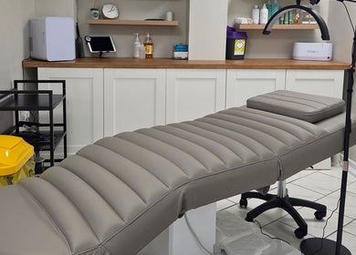 Elegant treatment room at Brow & Beauty, Mansfield, England, GB showcasing modern spa facilities.