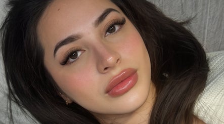 Close-up of woman with flawless skin and makeup at Inkbeauty, Framingham, Massachusetts, US.
