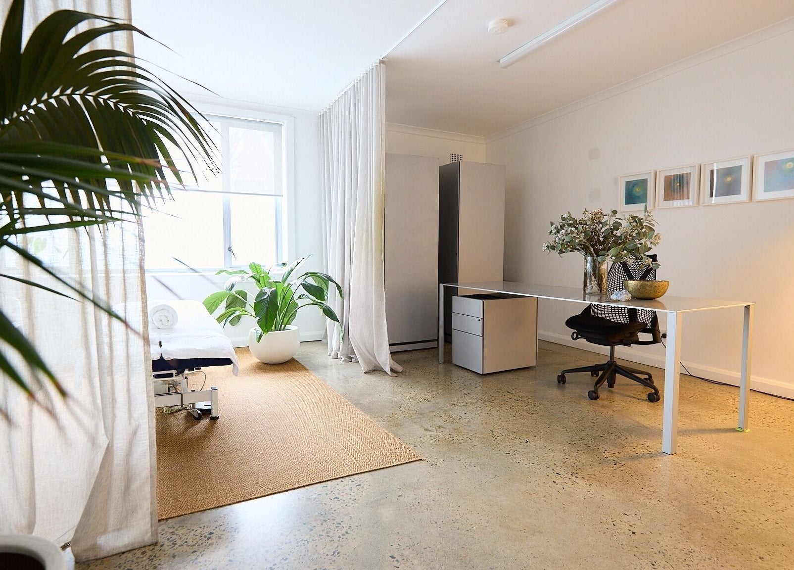 Calm therapy room at The Deep Unwind, Woollahra, New South Wales, AU with natural light and plants.