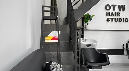 Stylish interior at Otw Hairstudio, Jawa Barat, ID, featuring elegant salon furniture and modern design.